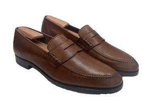 Brown penny loafer shoes
