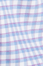 close up of blue and violet check shirt