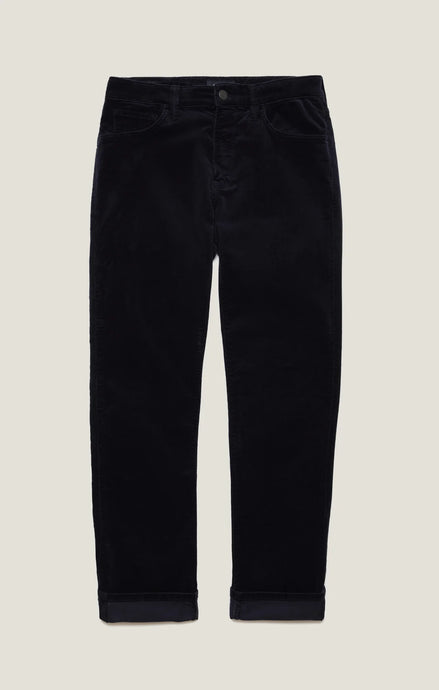 Black jeans on a beige background