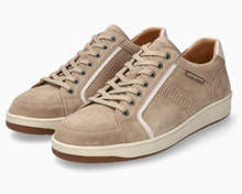 Pair of beige sneakers on a white background