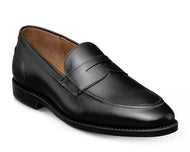 A black leather penny loafer with a sleek, polished finish and visible stitching detail.