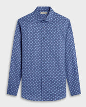 Blue patterned shirt on a light gray background