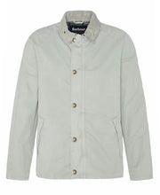 A Barbour Tracker Casual Jacket in a light beige color, featuring a collar, front pockets, and a zipper.