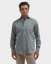 man wearing long-sleeve mini-floral print collared shirt in olive and blue