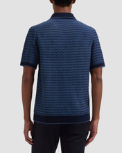 Back of man in two toned sweater with navy border from Bugatchi