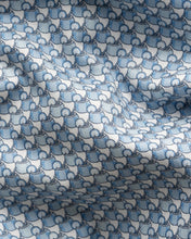Close-up of fabric with blue and white pattern