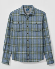 A long-sleeve button-up flannel shirt in a blue and green plaid pattern, featuring two buttoned chest pockets, displayed on a light gray background.
