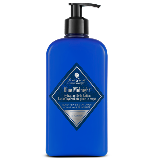 Blue bottle of Jack Black Blue Midnight Hydrating Body Lotion on a white background