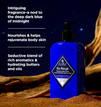 Blue bottle of Jack Black Blue Midnight Lotion on a dark background with text describing its features.