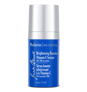 Blue skincare serum bottle with silver cap on a white background