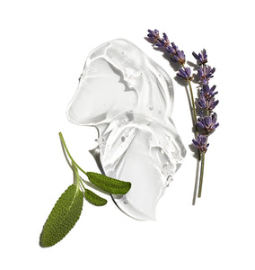 Clear gel-like substance with lavender flowers and leaves on a white background
