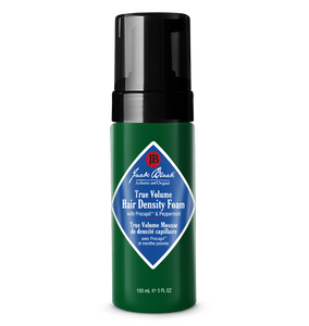 Green bottle of Jack Black True Volume Hair Density Foam on a white background