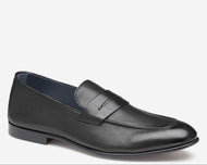 Black leather loafer shoe on a white background