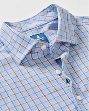 close up of blue plaid shirt