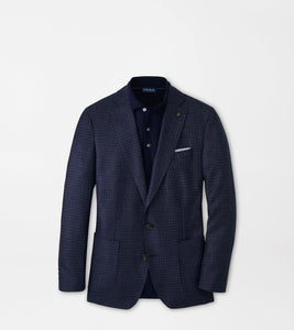 Navy checkered blazer on a light gray background