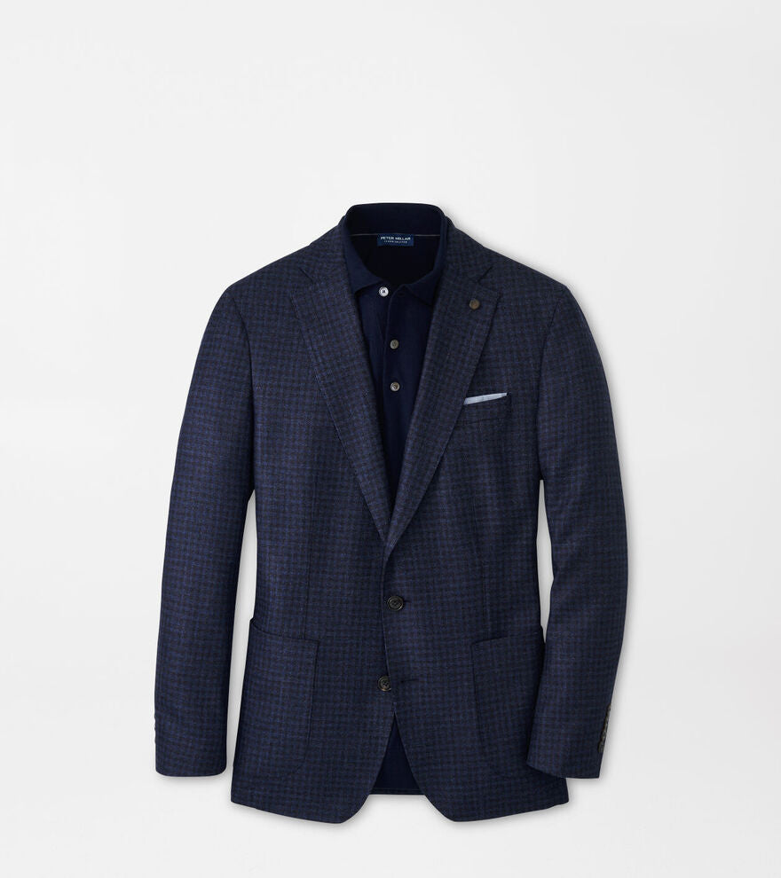 Navy checkered blazer on a light gray background