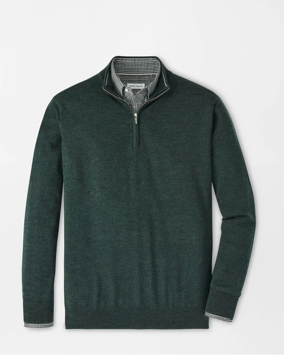 Green quarter-zip sweater on a light gray background