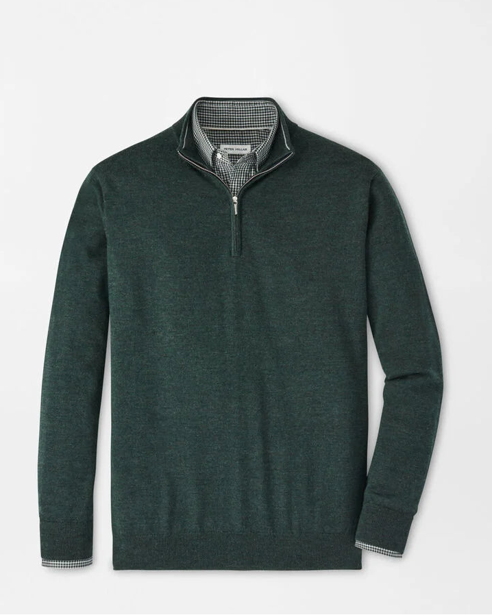 Green quarter-zip sweater on a light gray background