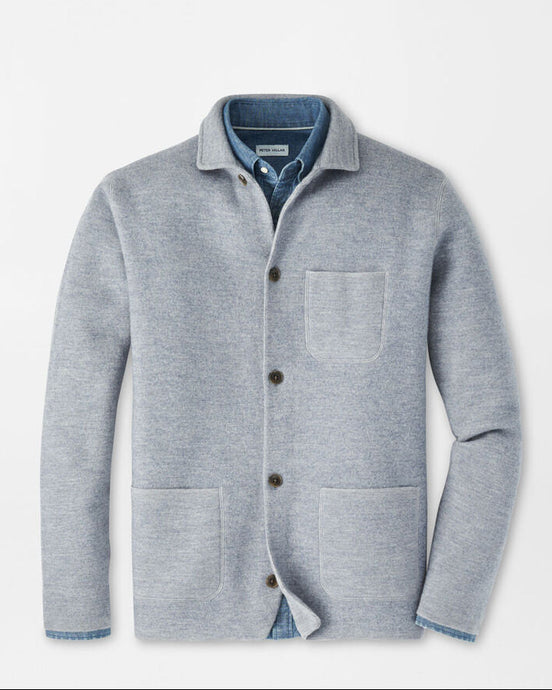 Gray cardigan with button details on a light gray background