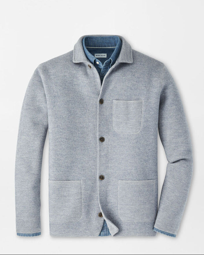 Gray cardigan with button details on a light gray background