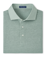 A folded Peter Millar men's polo shirt in a dusty sage green heather fabric, featuring a classic collar and a three-button placket.