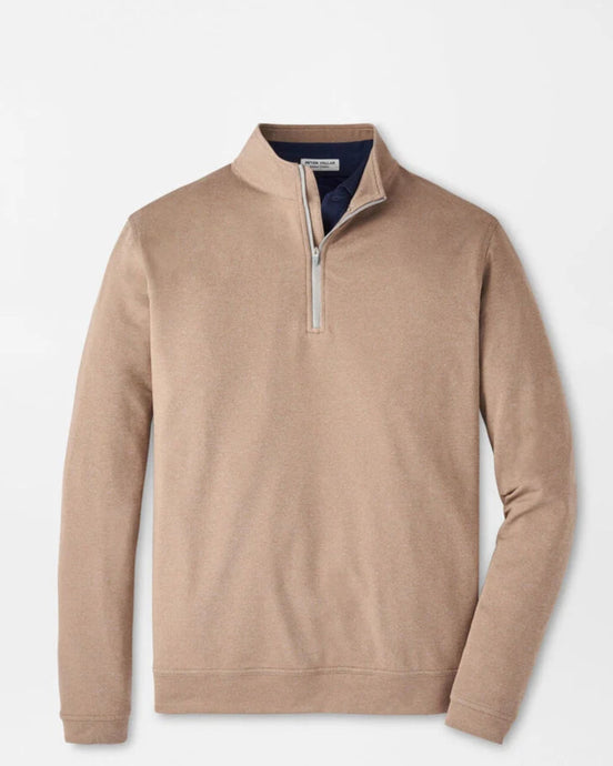 Beige long-sleeve shirt with a quarter-zip on a light gray background