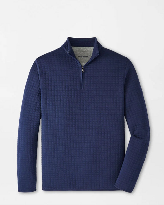 Blue textured pullover on a light gray background