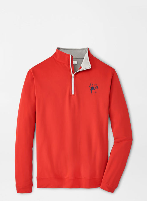 Red long-sleeve shirt with a logo on a light gray background