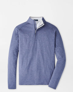 Blue long-sleeve shirt with a quarter zip on a light gray background