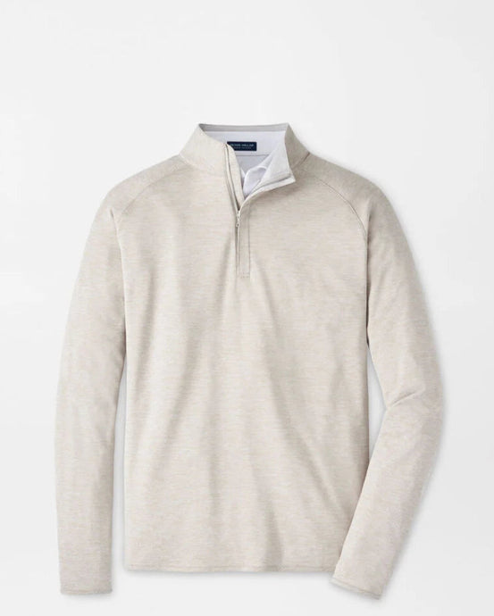 Beige sweater with a quarter zip on a light gray background