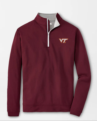 Maroon pullover with a logo on a light gray background