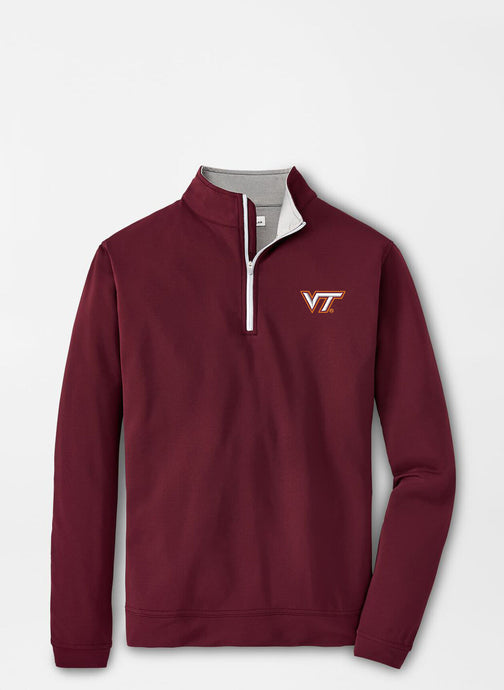 Maroon pullover with a logo on a light gray background