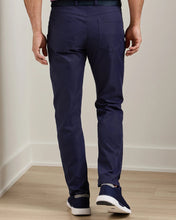 back of navy pants