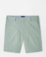 Green shorts on a white background