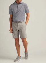 man in British gray shorts