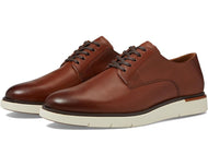 A pair of Allen Edmonds Carson Lace-up Hybrid Derbys, featuring a brown leather upper and a white sneaker-style sole.