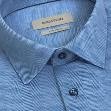 close up of herringbone print shirt