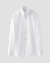 White dress shirt on a light gray background